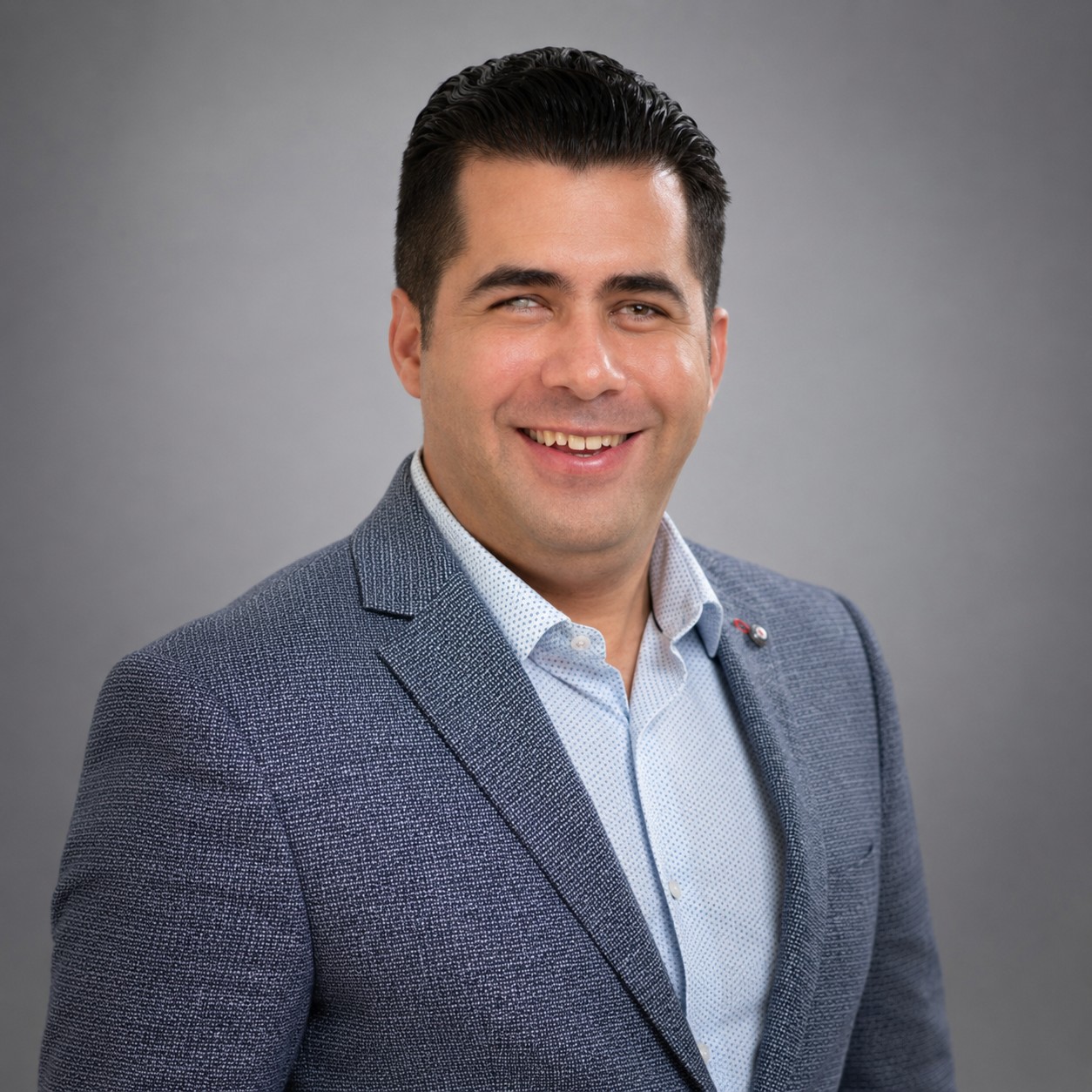 Jose Cintron, founder of True Vision Mentoring, smiling in a professional headshot
