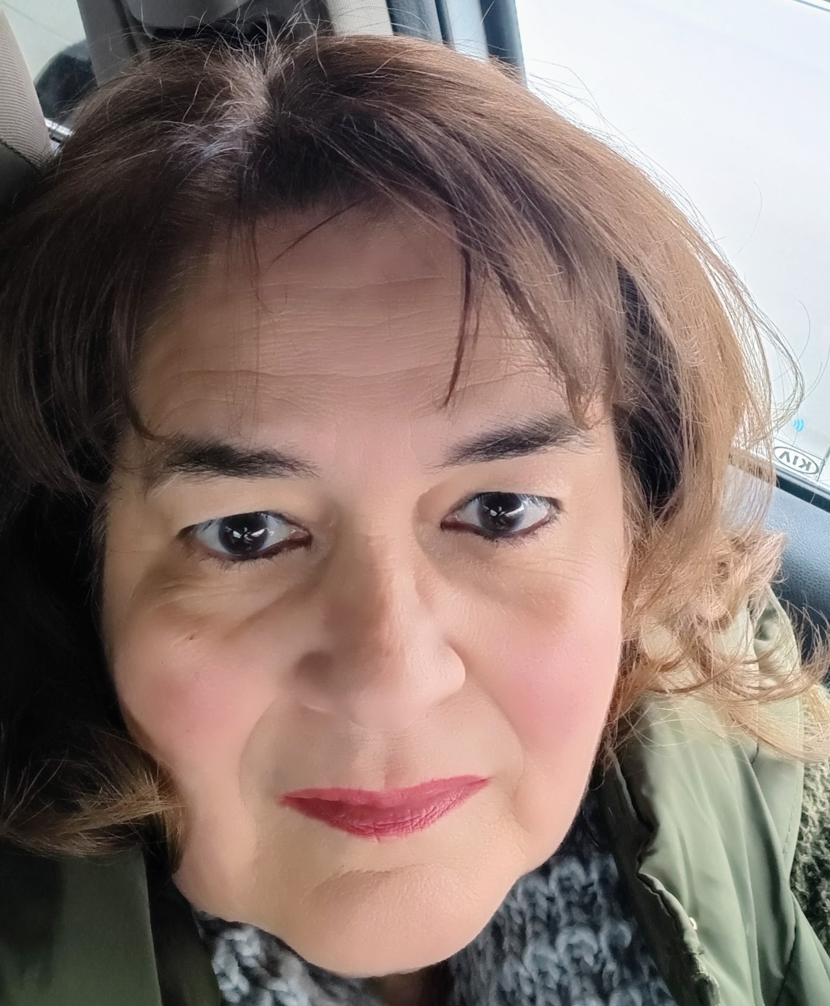 Tatiana P., former colleague and educator, smiling in a photo
